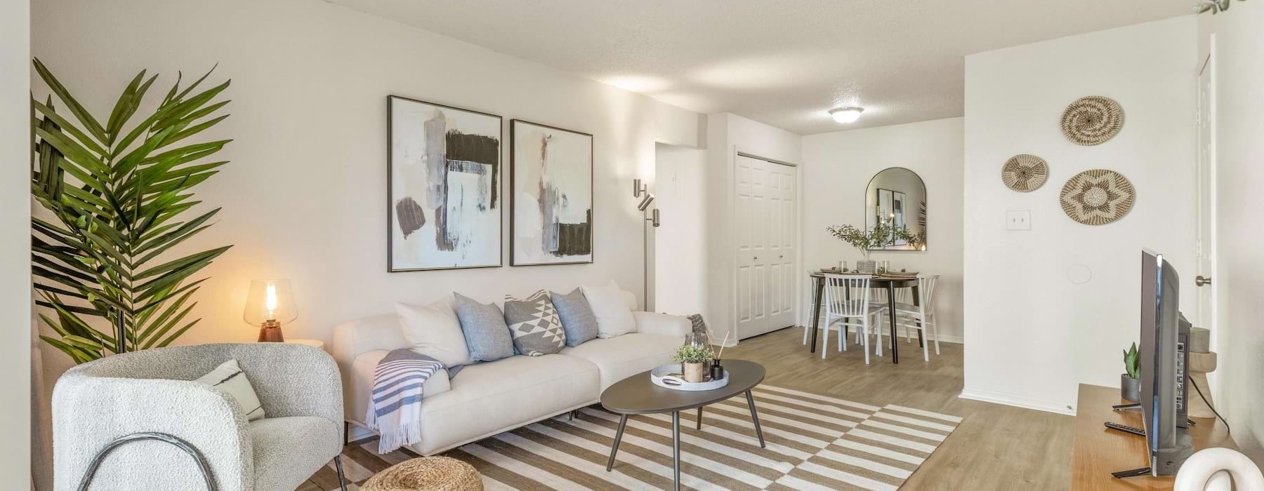 a living room with a couch and a chair