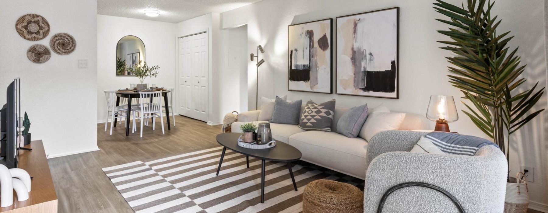 a living room with a couch and a table